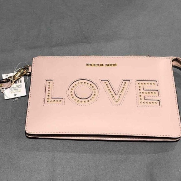 Michael Kors Handbags - NWT Michael Kors Love wallet/wristlet